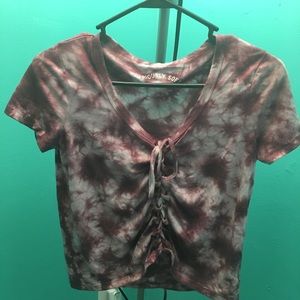 a red tye dye lace shirt